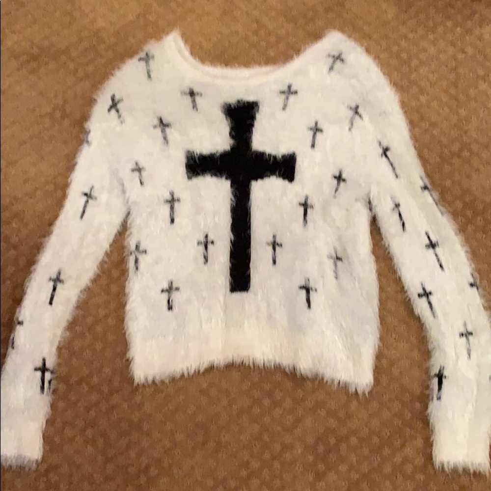 Cross sweater
